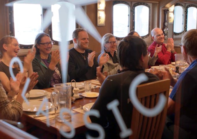 M/S Sjøveien passengers enjoying dinner together
