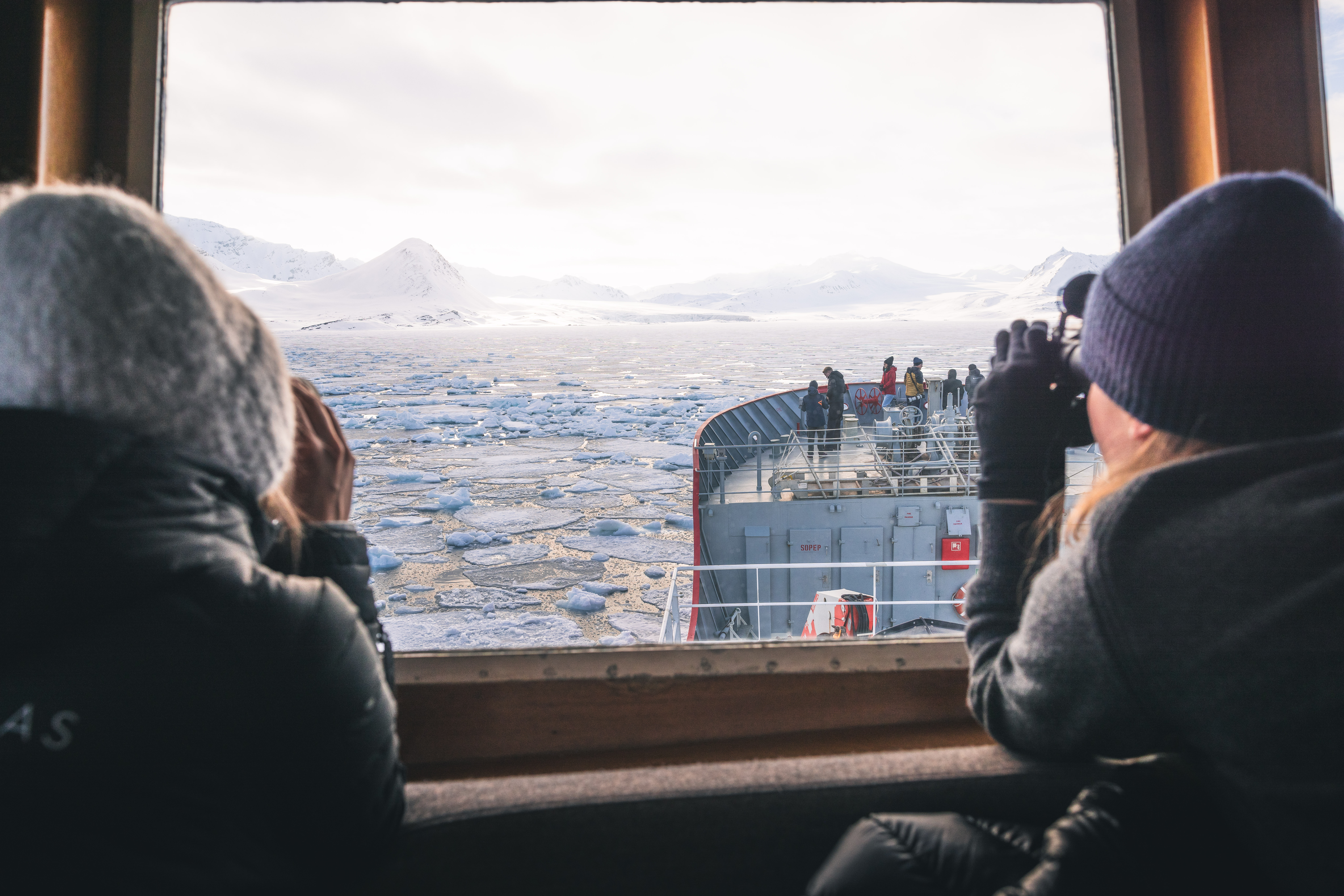 Spotting wildlife from the bridge, Svalbard