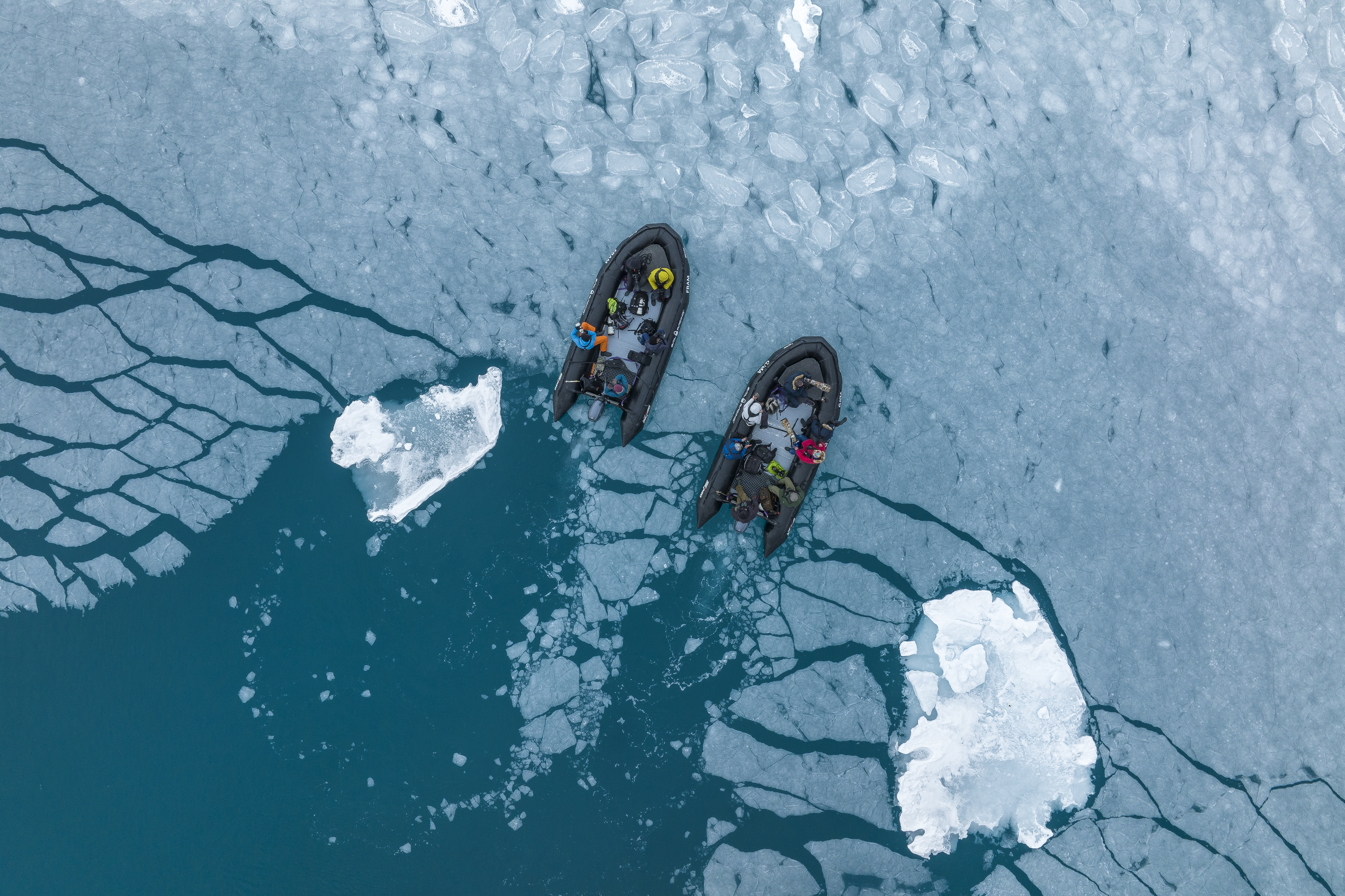 Zodiacs on the edge of the ice, Svalbard