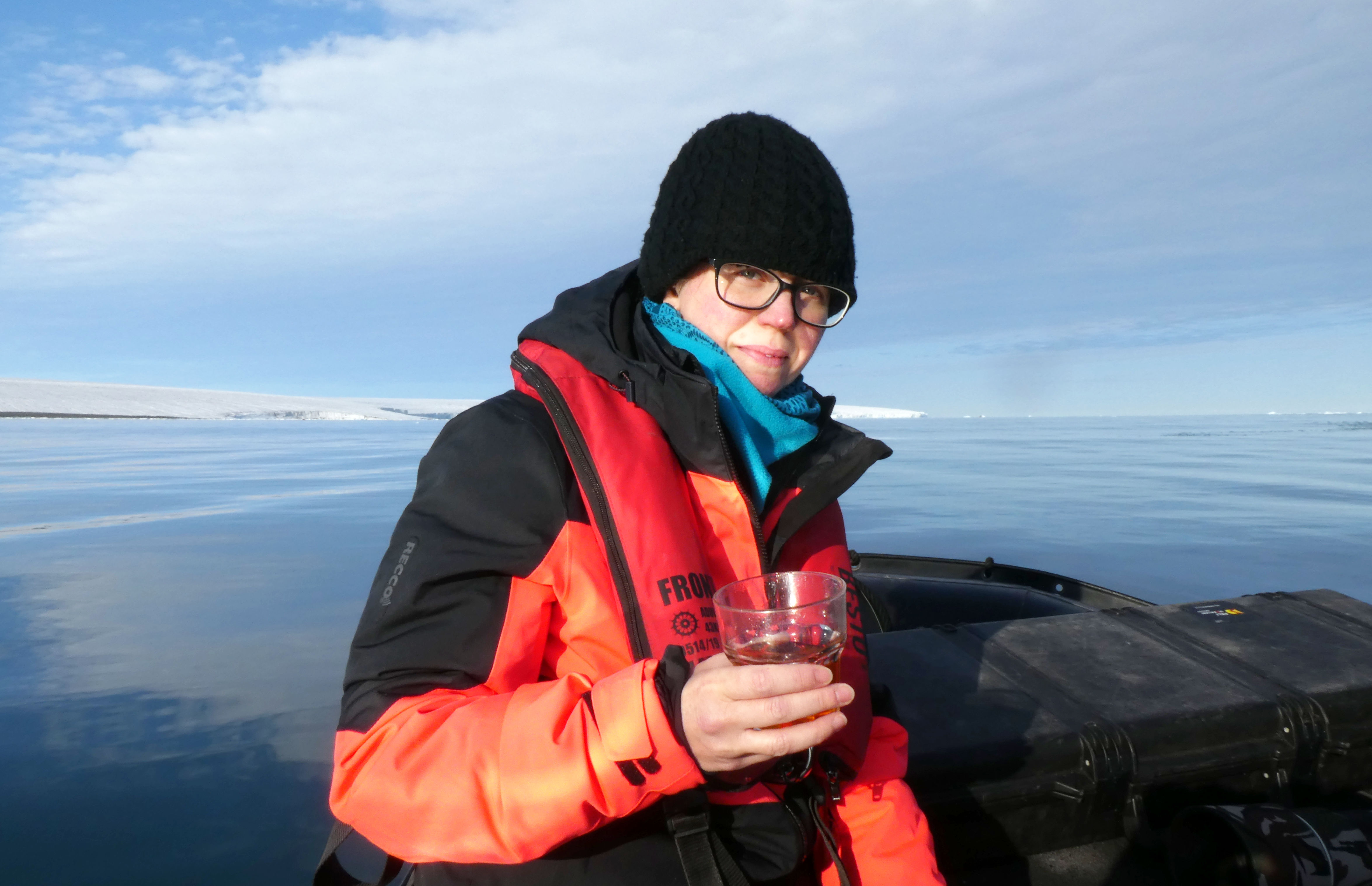 Hannah celebrating during a zodiac cruise in Svalbard