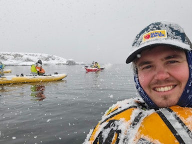 Swoop team member Nardus takes a selfie while kayaking in the Arctic