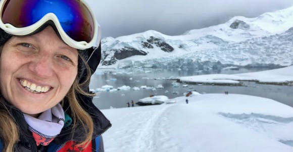 Woman smiling in Antarctica
