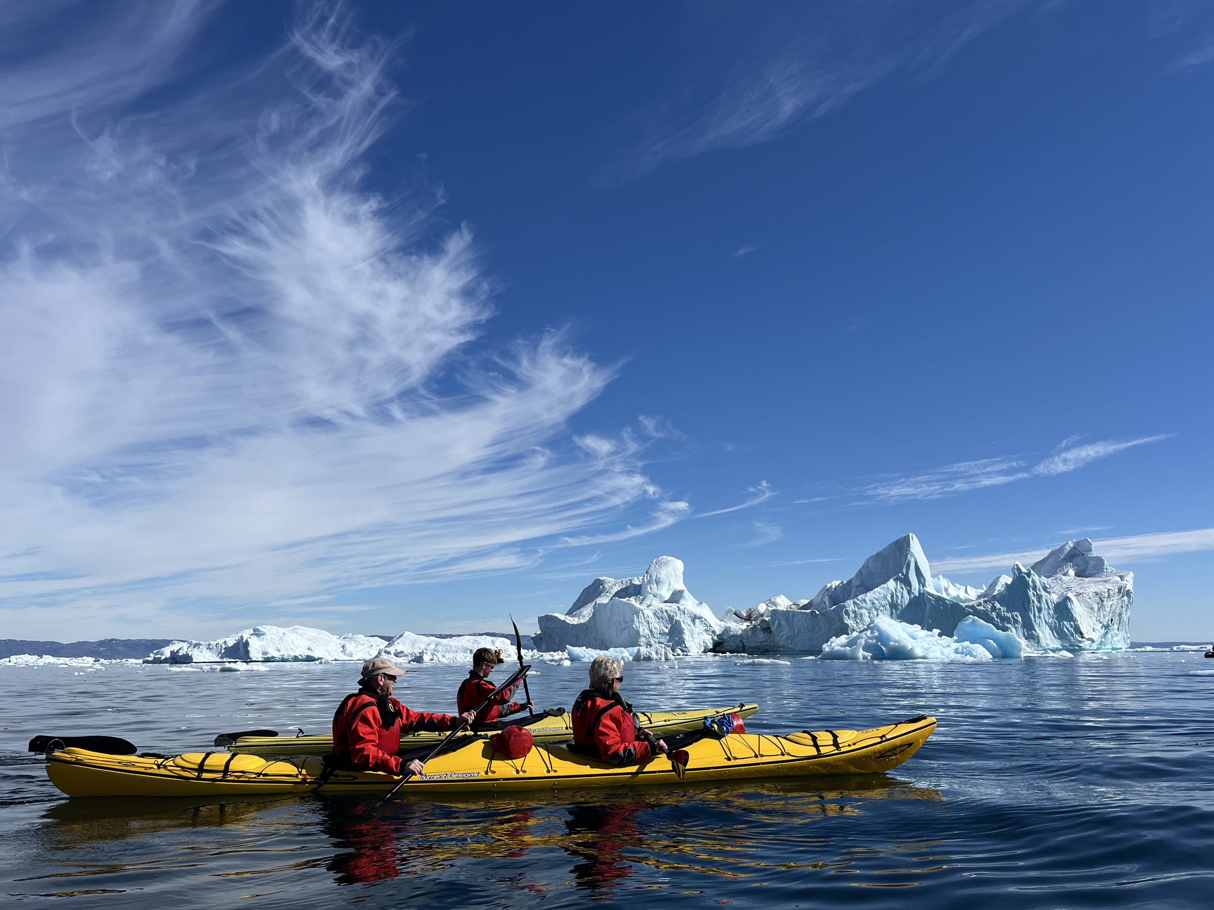 Kayaking amongst icebergs in Greenland