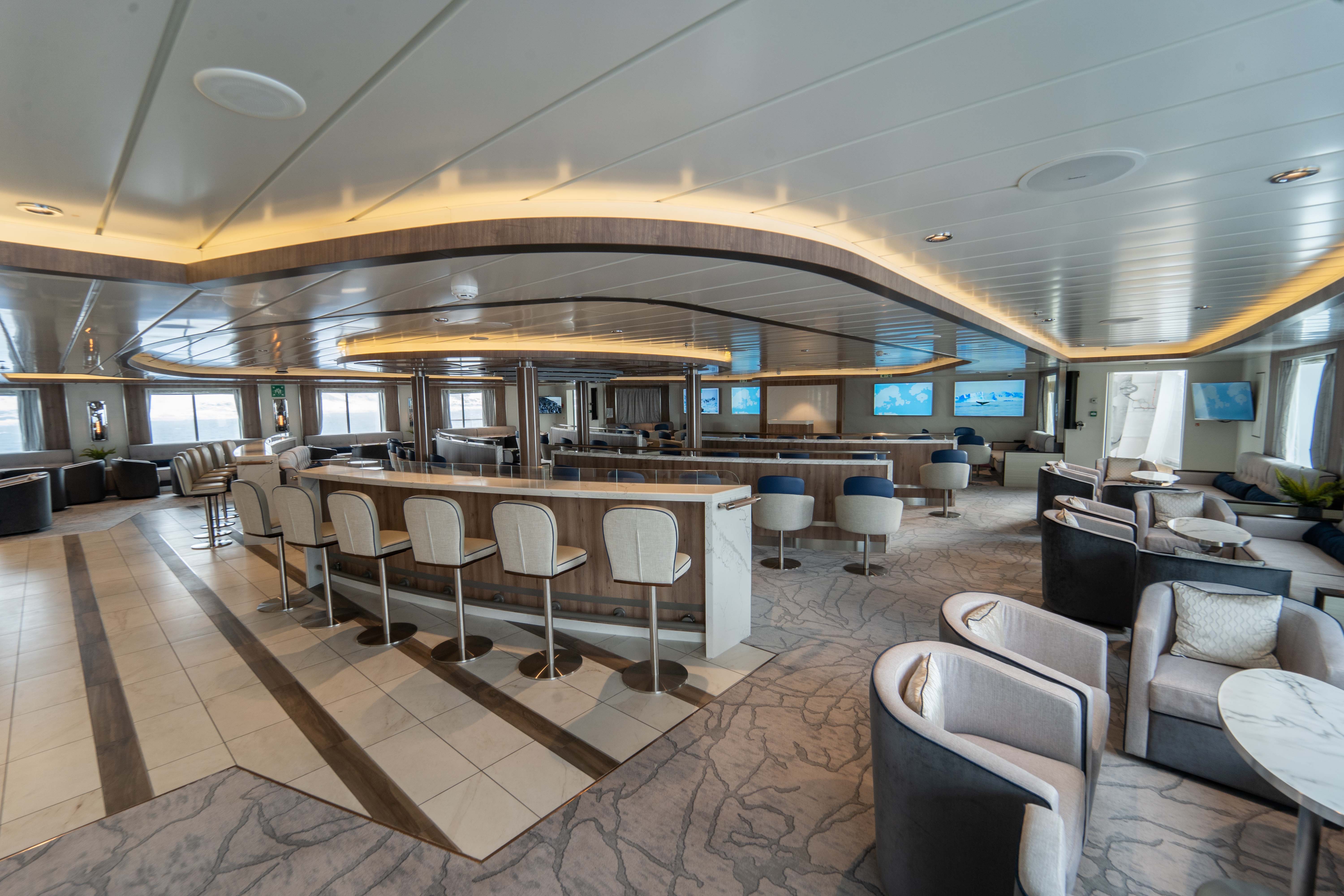 Lecture lounge on the Greg Mortimer, an Arctic ship