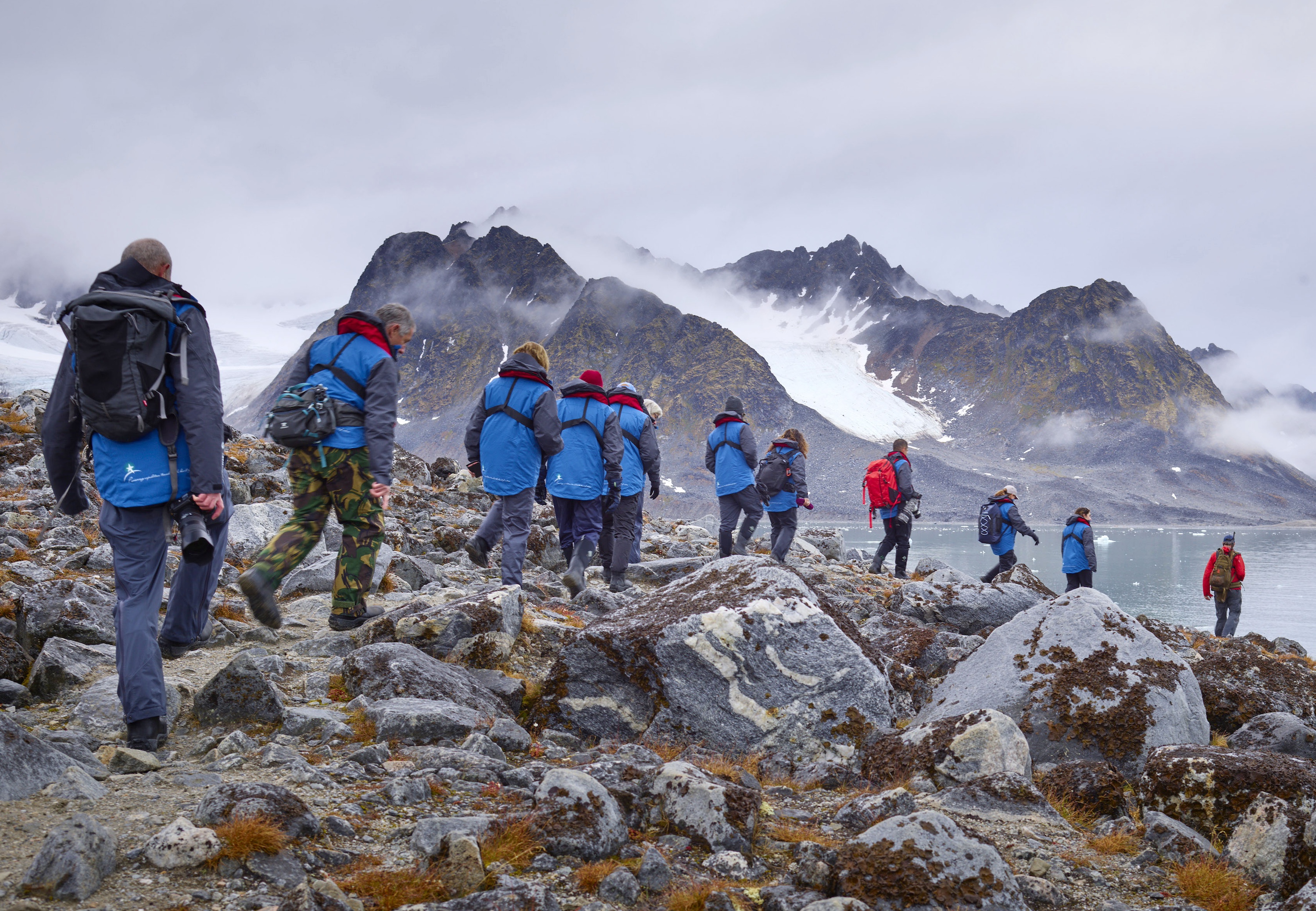 Guests hike at Magdalena on an Arctic cruise